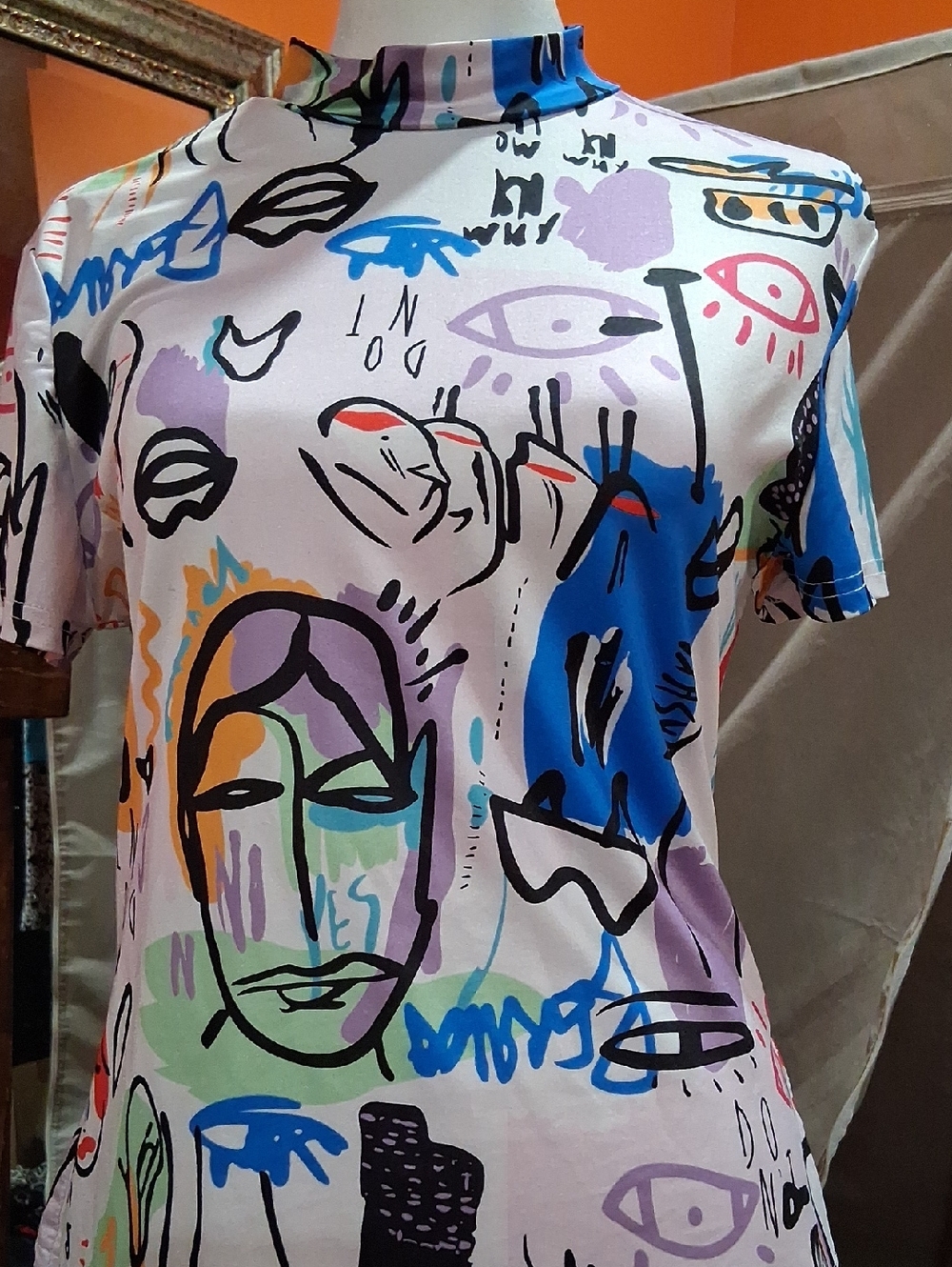 Abstract Face Print Mock-Neck Short Sleeve Top in Multi